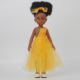Poupée noire aux cheveux crépus et magnifique robe jaune - Bontle